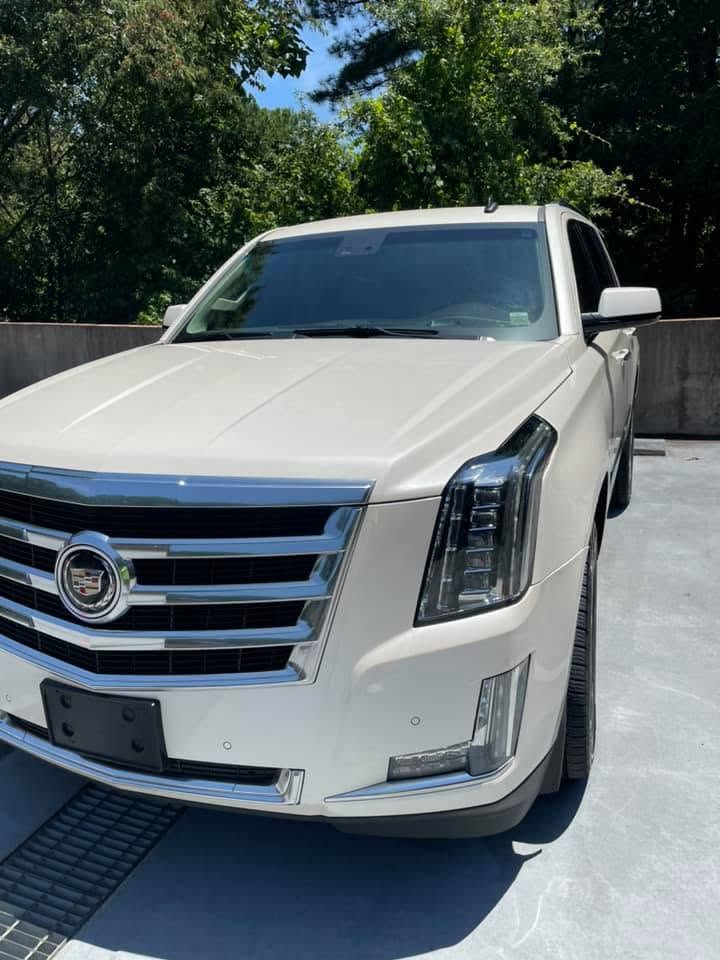 White full-size SUV cleaned inside and out